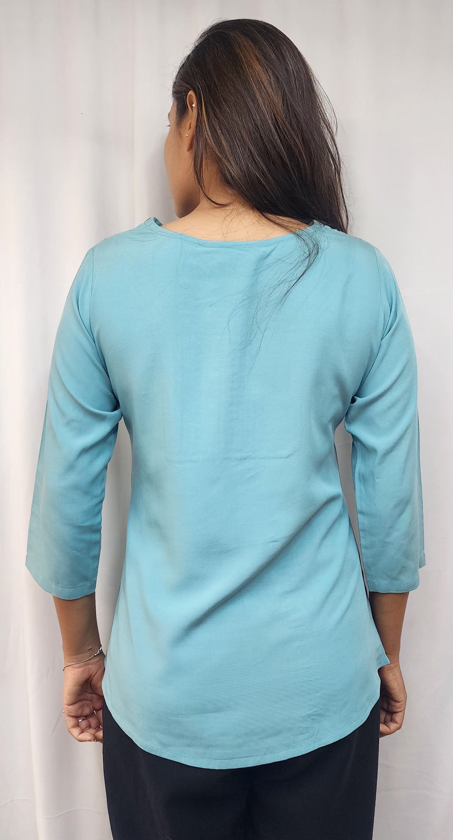 WOMENS SOLID EMBROIDERED TOP IN BLUE WITH V NECK, 3/4 TH SLEEVES, COLOURFUL GEOMETRIC EMBROIDERY ON THE YOKE