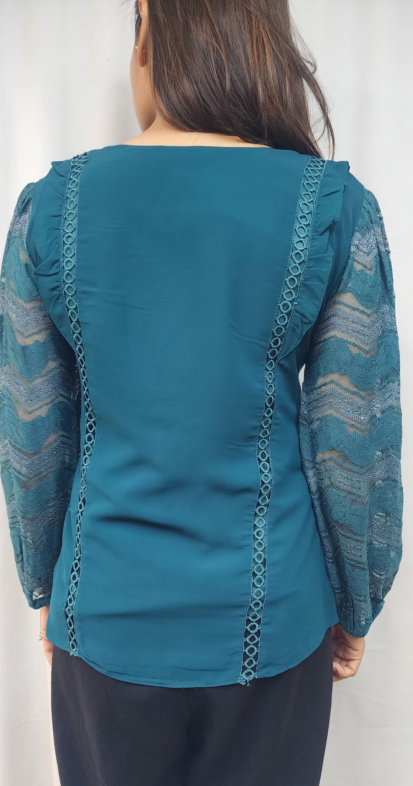 WOMENS SOLID TOP IN BLUE WITH KEYHOLE NECK. LACE & RUFFLE DETAILING ON BODY & LACE SLEEVES