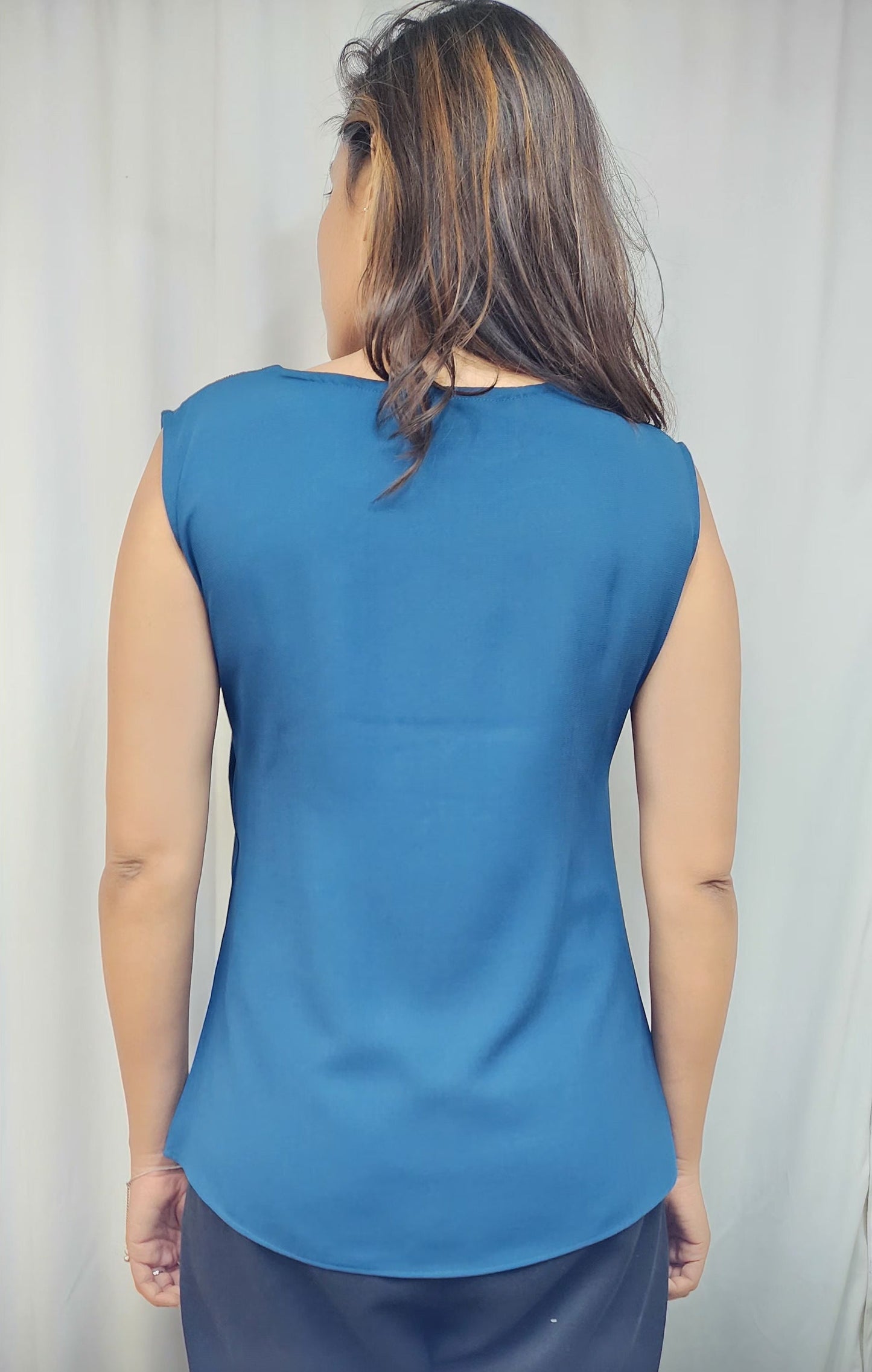 WOMENS SOLID TOP WITH FLORAL EMBROIDERY. SLEEVELESS ROUND NECK TOP