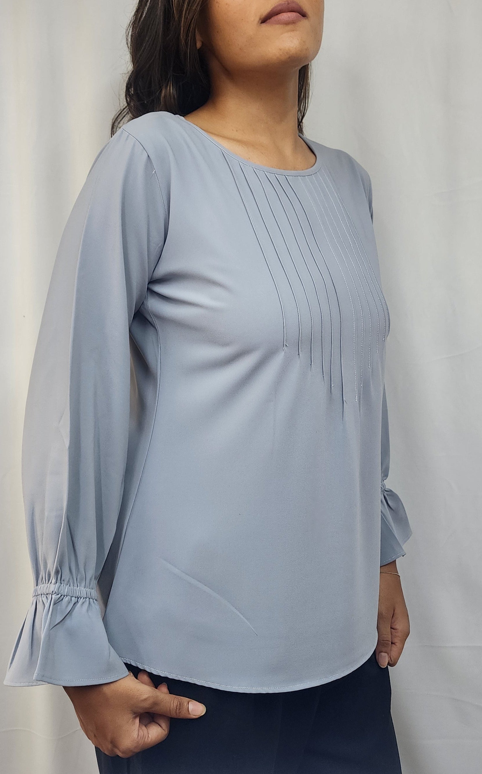 SOLID TOP WITH PINTUCKS DETAIL IN GREY & BISHOP SLEEVES