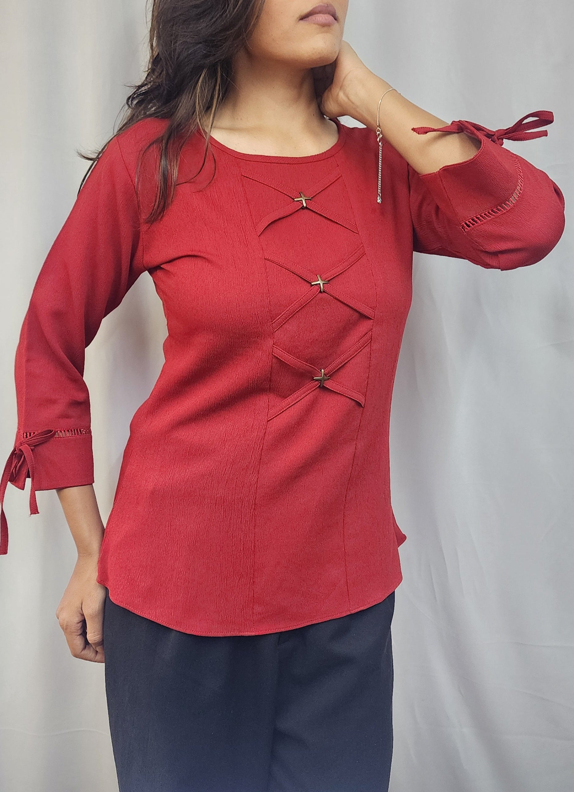 WOMENS SOLID RED TOP WITH FABRIC & METAL DETAIL IN THE FRONT & 3/4TH SLEEVES WITH LACE & TIE-UP.