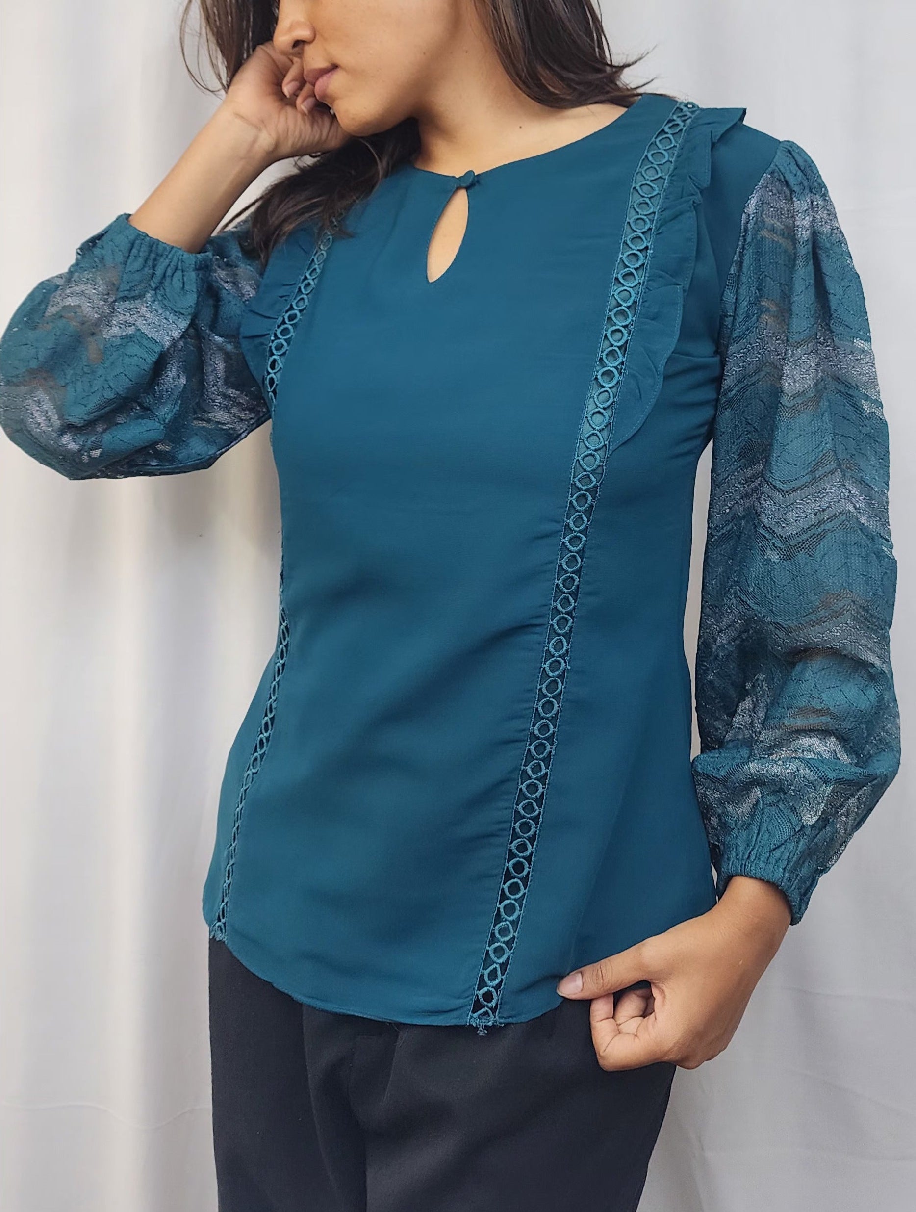 WOMENS SOLID TOP IN BLUE WITH KEYHOLE NECK. LACE & RUFFLE DETAILING ON BODY & LACE SLEEVES