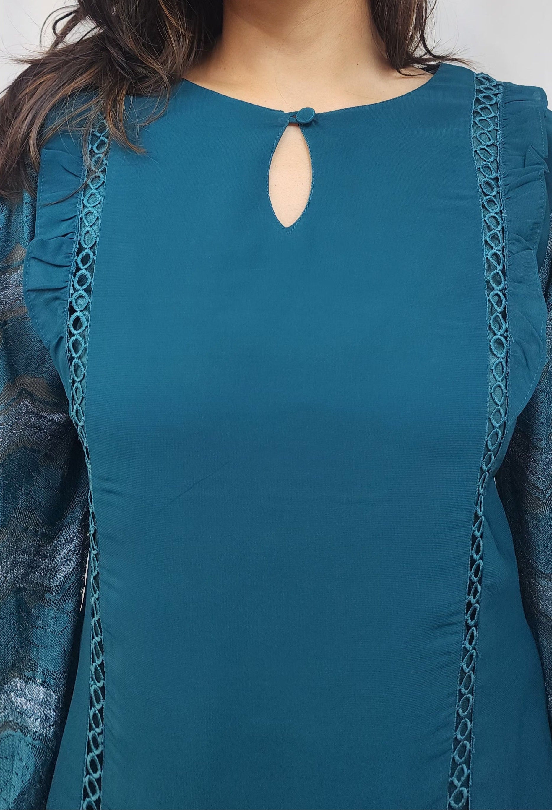 WOMENS SOLID TOP IN BLUE WITH KEYHOLE NECK. LACE & RUFFLE DETAILING ON BODY & LACE SLEEVES
