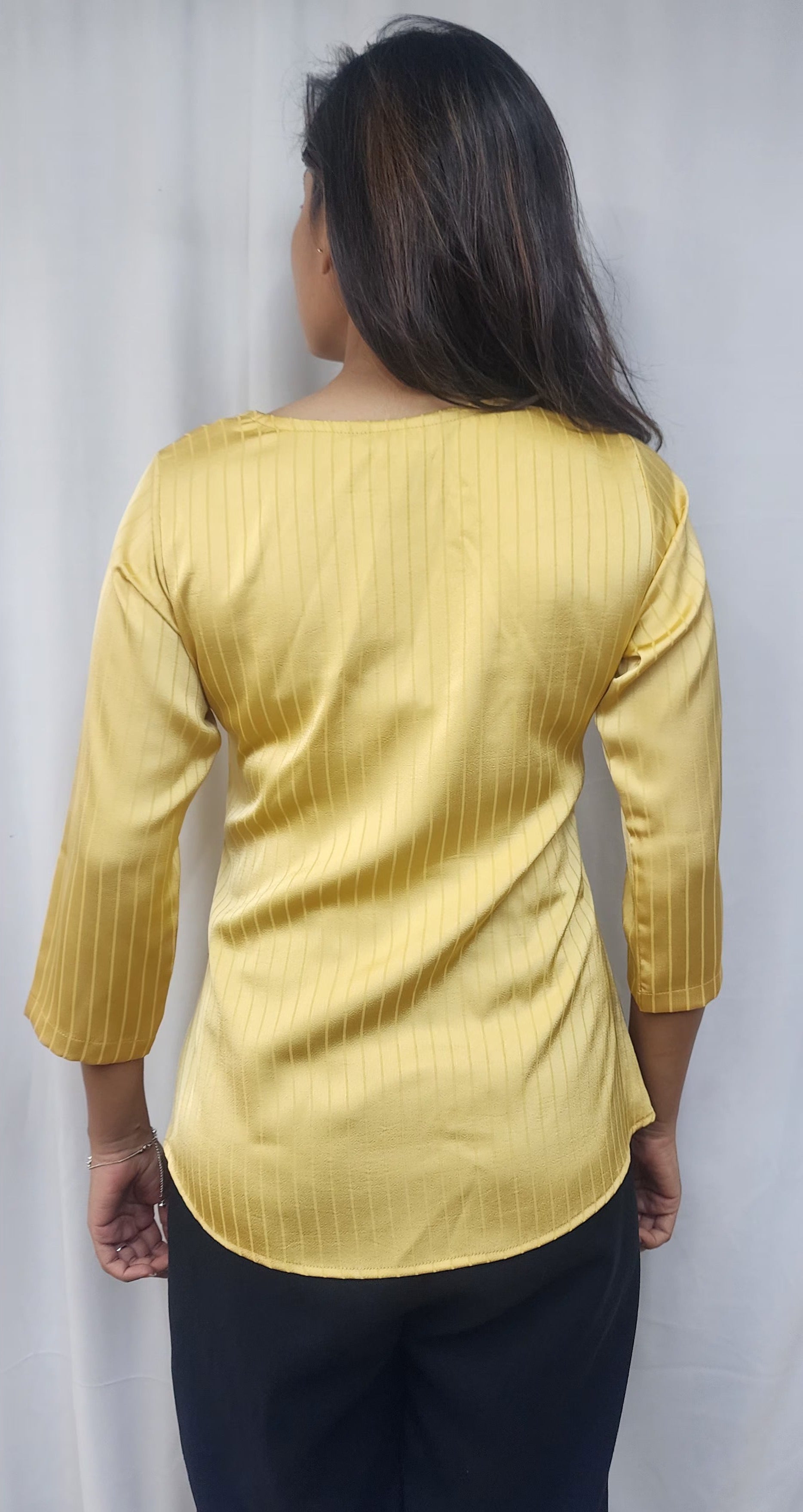WOMENS DIAMOND EMBELLISHED TOP IN YELLOW WITH ROUND NECK 7 3/4TH SLEEVES.