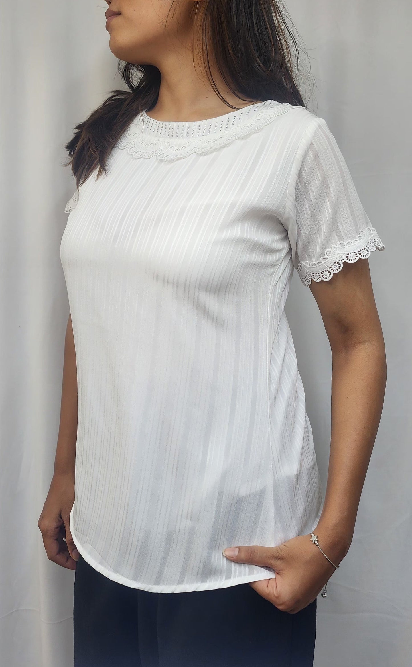WOMENS SOLID TEXTURED TOP WITH LACE DETAILING ON NECKLINE . DIAMOND EMBELLISHMENT ON NECK & SHORT SLEEVES WITH LACE DETAIL