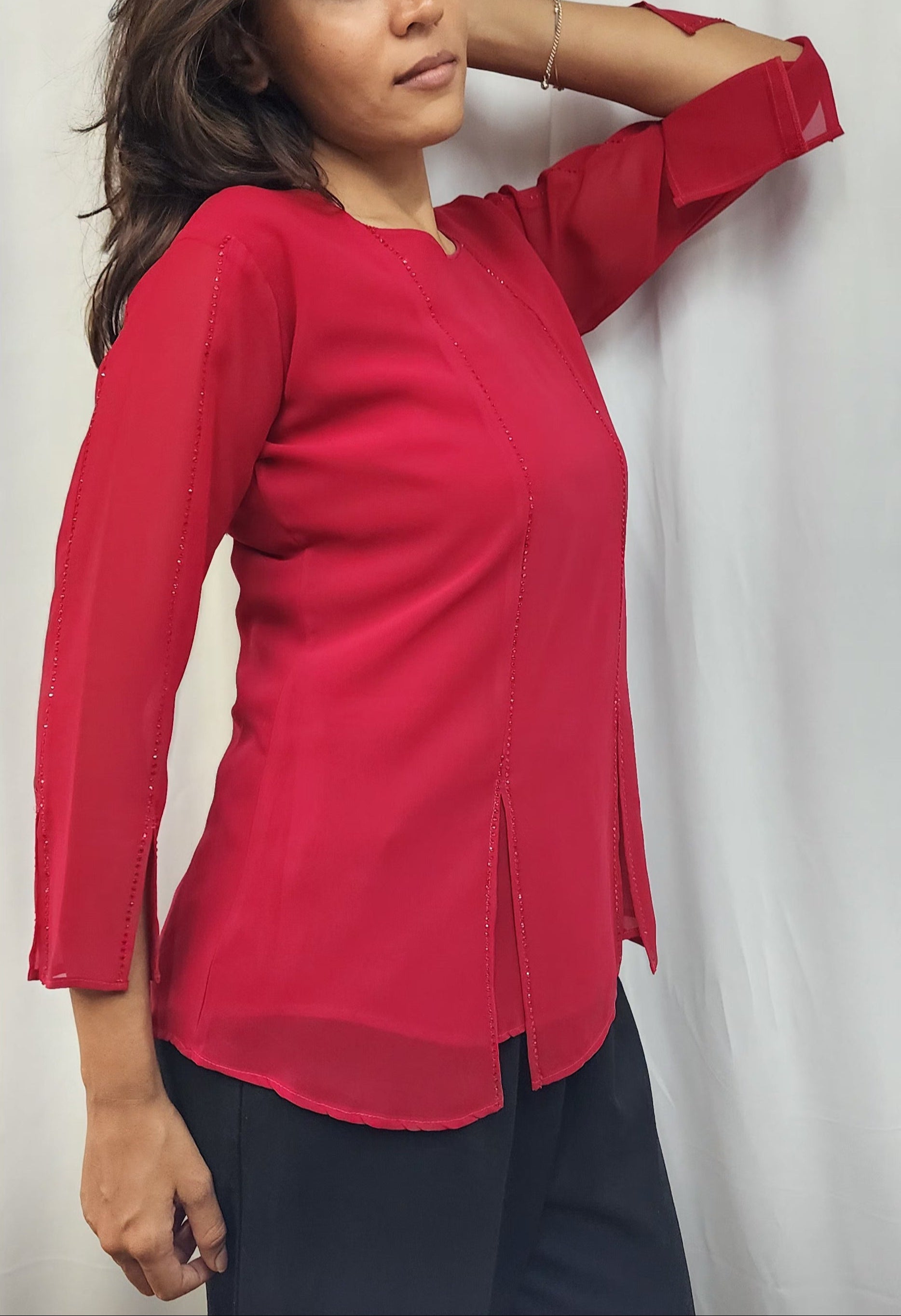 WOMENS SOLID TOP WITH DIAMOND EMBELLISHMENT IN PINK. ROUND NECK, 3/4TH SLEEVES WITH SLIT ON FRONT & SLEEVES.