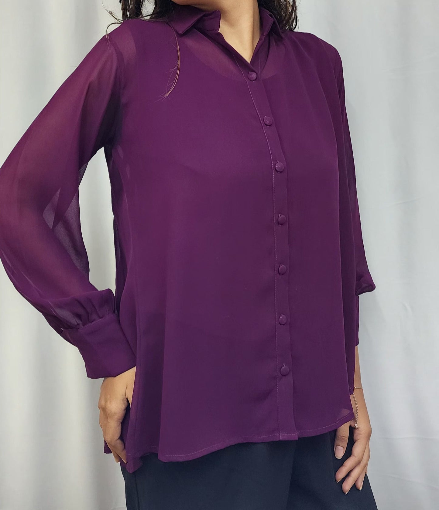 WOMENS SOLID PURPLE SHIRT WITH FLARE. BACK YOKE WITH PLEATED. FLY COLLAR, FULL SLEEVES WITH CUFF