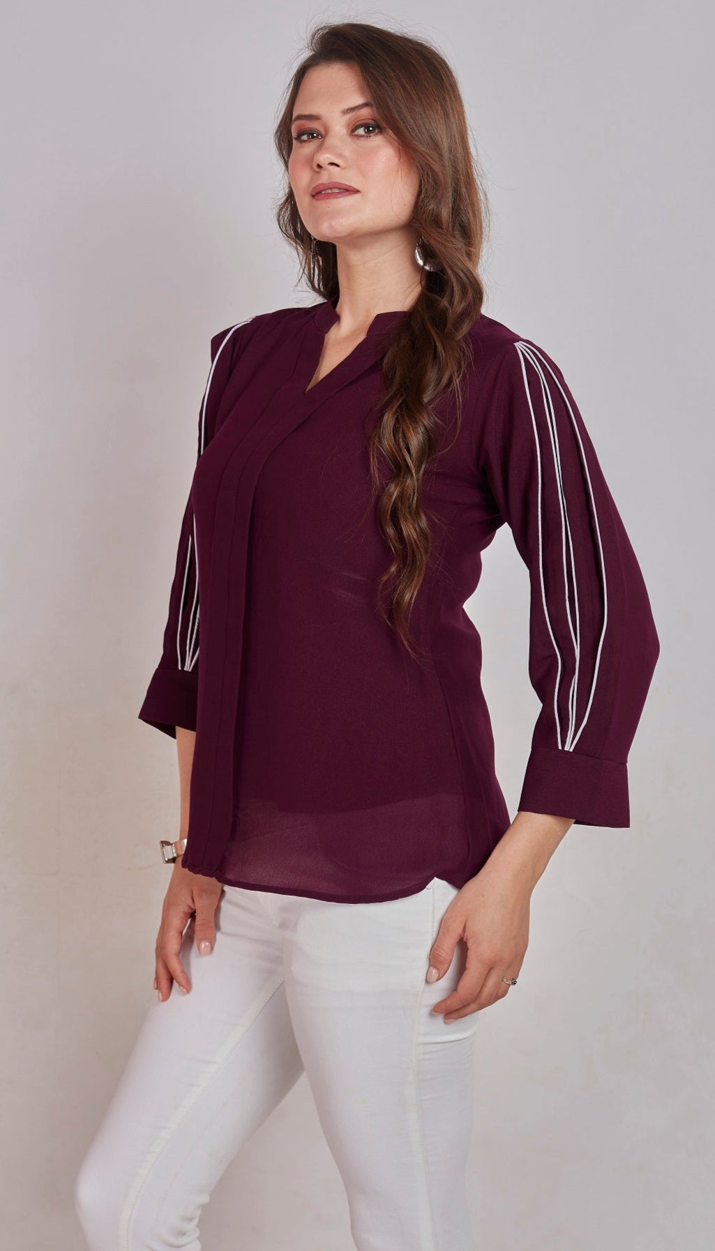 SOLID TOP WITH PLEAT DETAIL ON SLEEVES - WINE