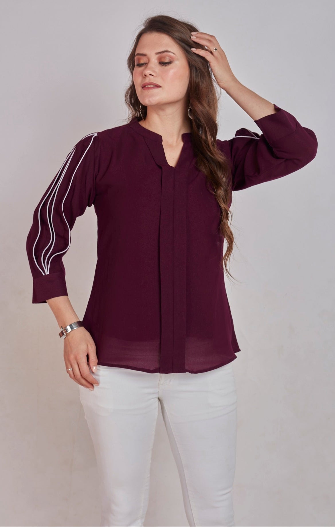 SOLID TOP WITH PLEAT DETAIL ON SLEEVES - WINE